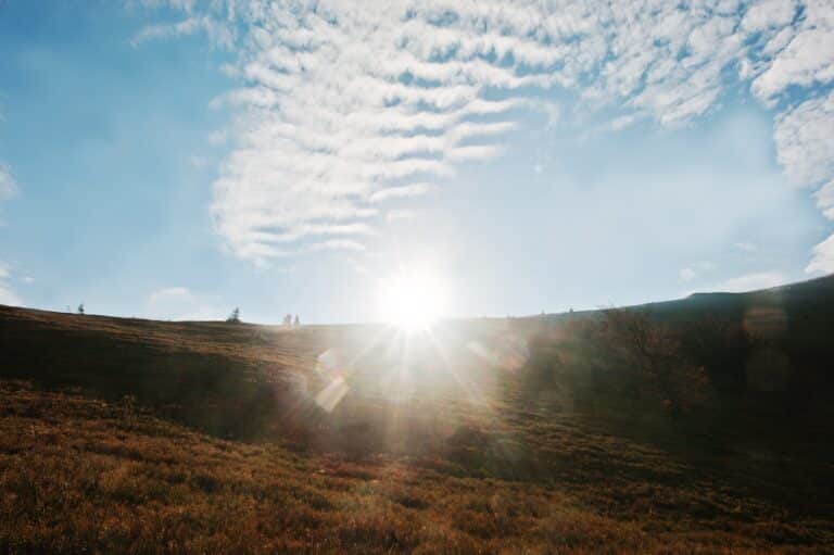 Heavenly sky with sunlight at Carpathian mountains. Beauty world